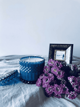 Load image into Gallery viewer, Blue mandala glass soy candle with double wicks, hand-poured and beautifully presented with floral decor.