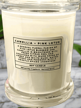 Load image into Gallery viewer, Medium white Monaco soy candle in clear glass jar with elegant label.