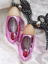 Load image into Gallery viewer, Pink bullet car diffuser with wooden cap and hanging cord, displayed upright for a clear view of design.