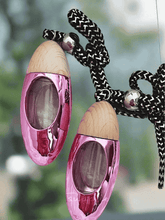 Load image into Gallery viewer, Pink bullet car diffuser with wood top hanging by cord, releasing fragrance for cars and small spaces.