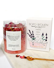 Load image into Gallery viewer, Goddess bath soak jar and box displayed with dried roses and botanicals, luxurious rose and coconut self-care blend.