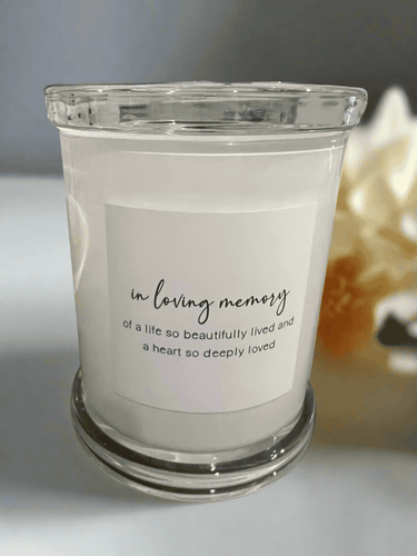 In Loving Memory memorial candle in a clear glass jar with the message: of a life so beautifully lived and a heart so deeply loved.