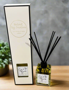 Sex on the Beach reed diffuser by Natural Soy Creations, square glass bottle with black reeds and matching gift box