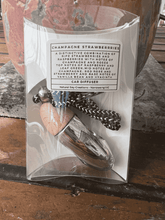 Load image into Gallery viewer, Silver bullet car diffuser with wooden cap shown in retail packaging by Natural Soy Creations.
