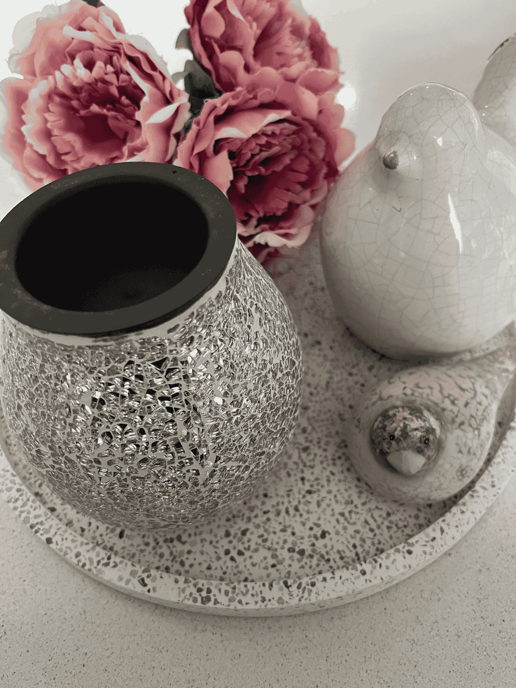 Natural Soy Creations Silver Mosaic Electric Heat Plate Wax Warmer displayed on a tray with pink flowers.