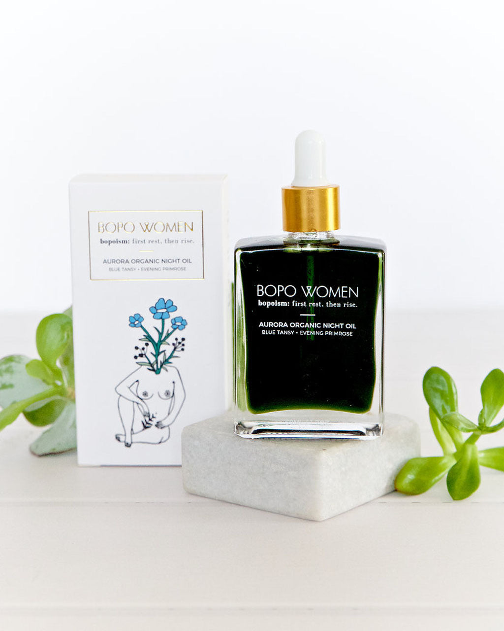 Aurora Organic Night Oil by Bopo Women with box, rich blue elixir for nourishing and calming nighttime skincare.