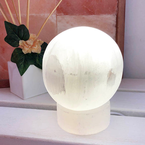 Selenite sphere crystal lamp with warm glow – Natural Soy Creations wellness lighting